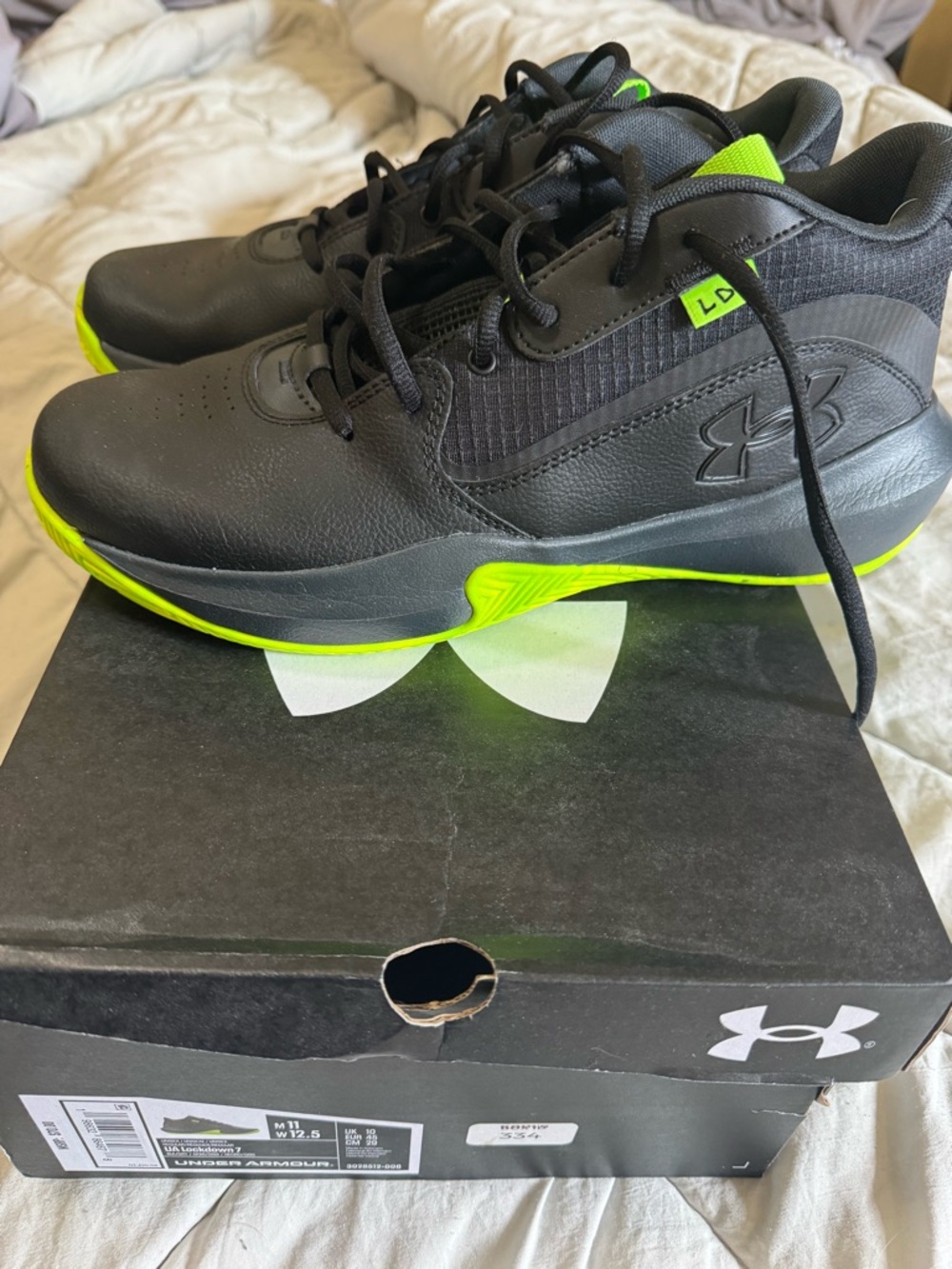 Under Armour Men’s Black with Neon Green Accents Athletic Trainers